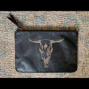 Western inspired genuine leather clutch